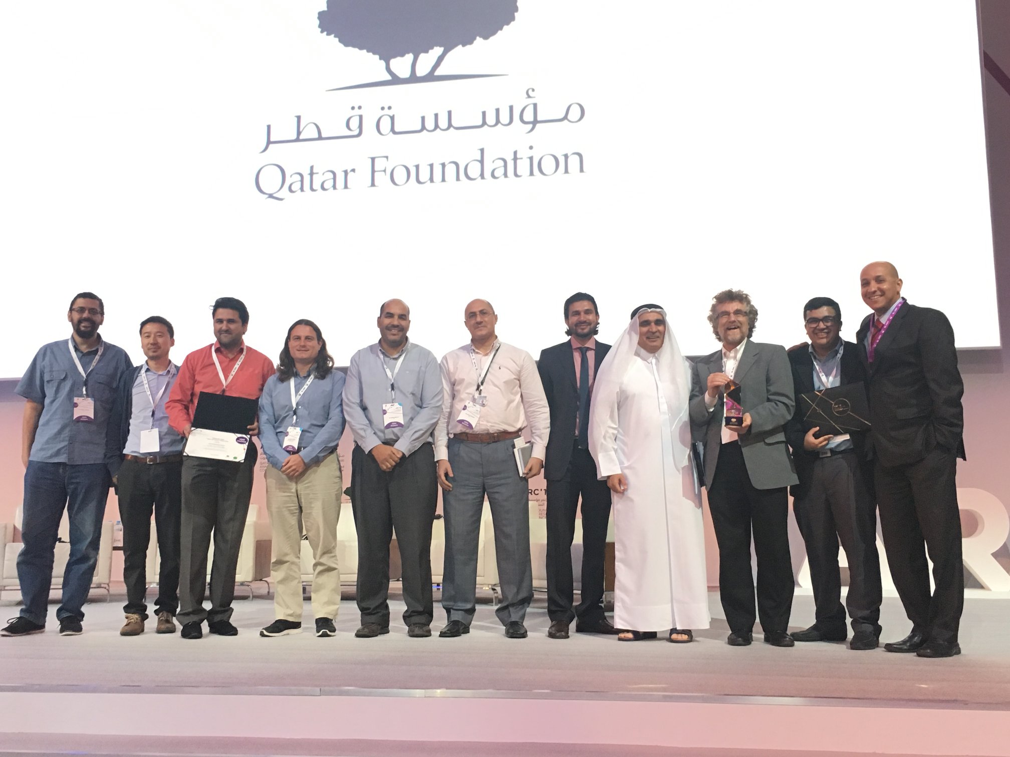 Part of the Arabic Language Technologies team after receieving the award